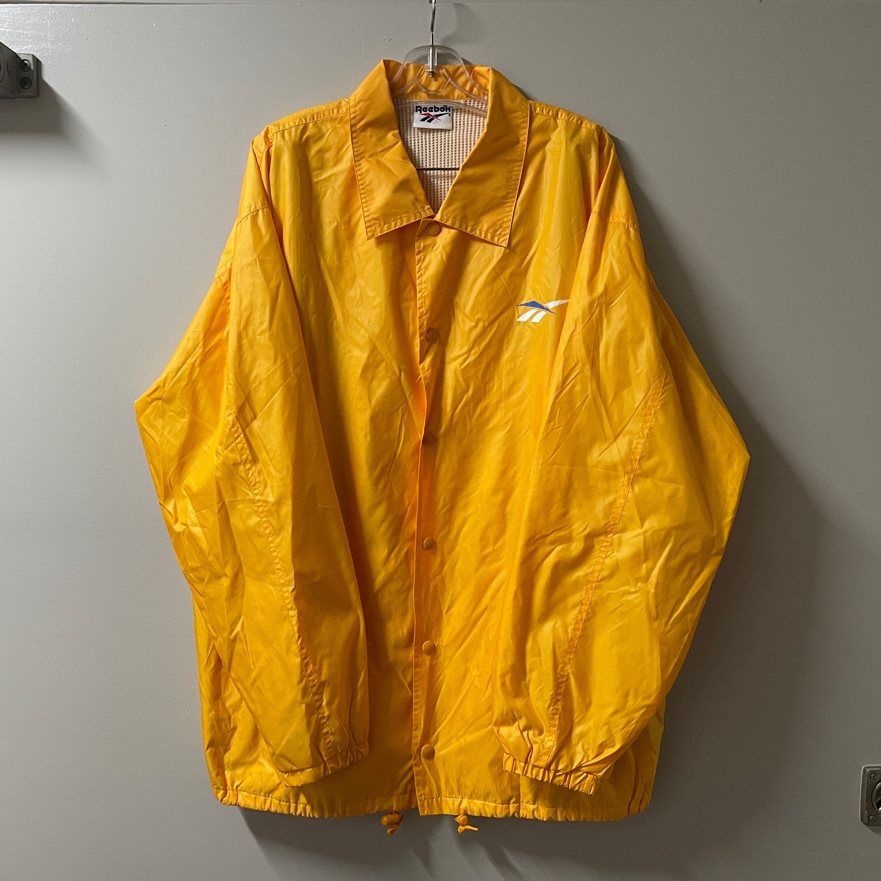 Reebokのyellowナイロンジャケット | PAY ID