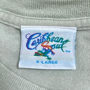 【Caribbean Soul】バックプリント Tシャツ 両面プリント イラスト コピーライト2002 X-LARGE ミント カリビアン 海 オウム ヨット 楽譜 ギター 地図 半袖 夏物 US古着