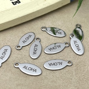 ステンレス製ミラーサーフボード型アロハチャーム/ハワイアン/ALOHA