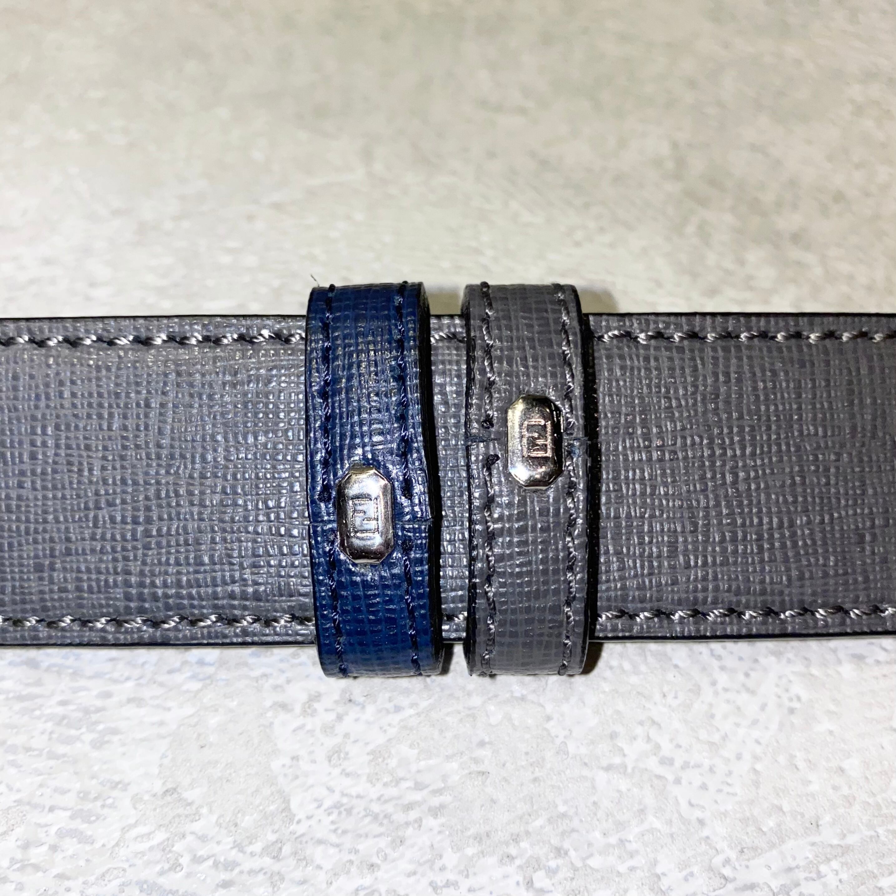 Fendi ネイビー レザーベルト Fロゴバックル モンスターアイズ FENDI blue×gray reversible leather belt “monster” | NOIR ONLINE
