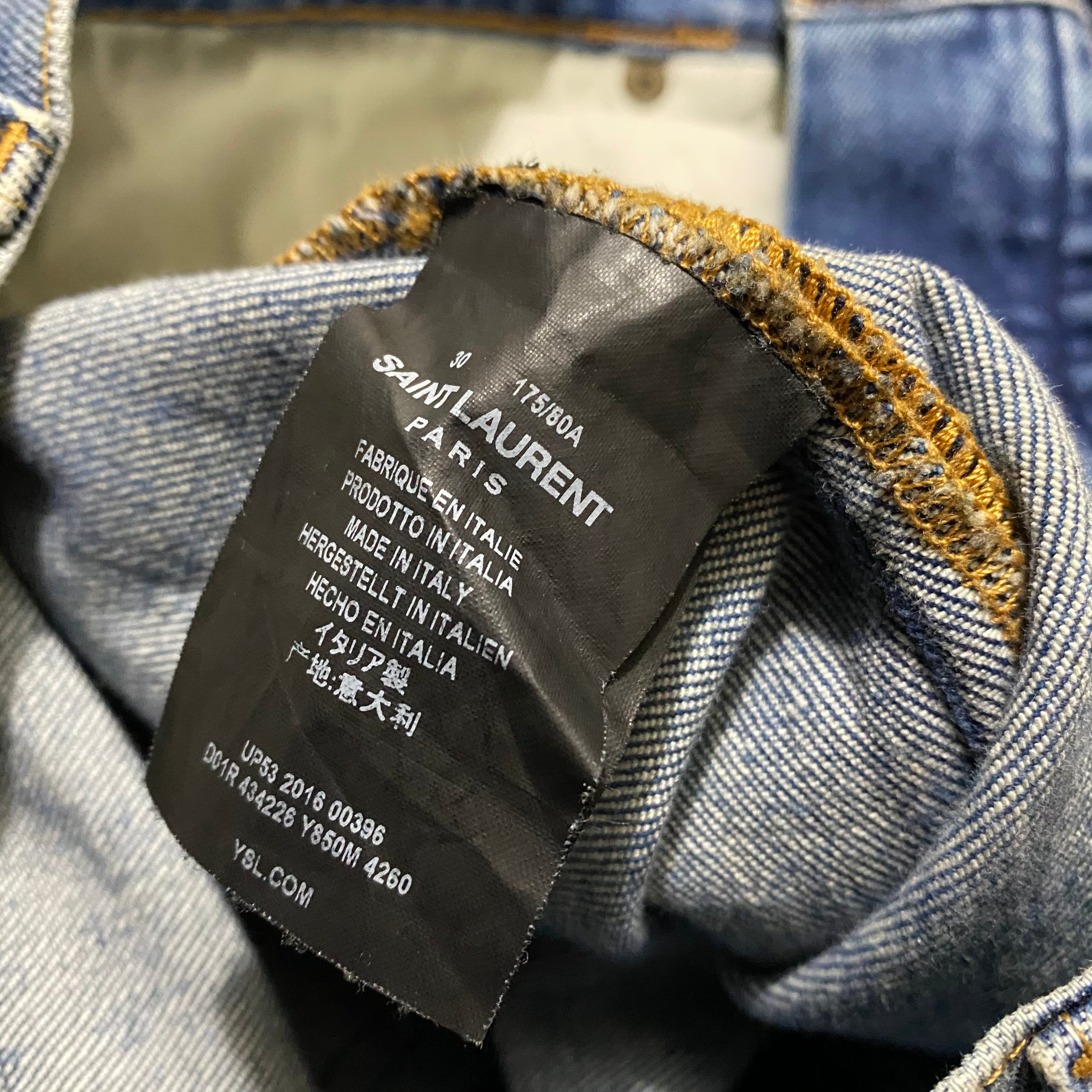 SAINT LAURENT PARIS faded denim skinny pants | NOIR ONLINE
