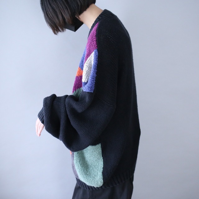 black base colorful art pattern over silhouette knit