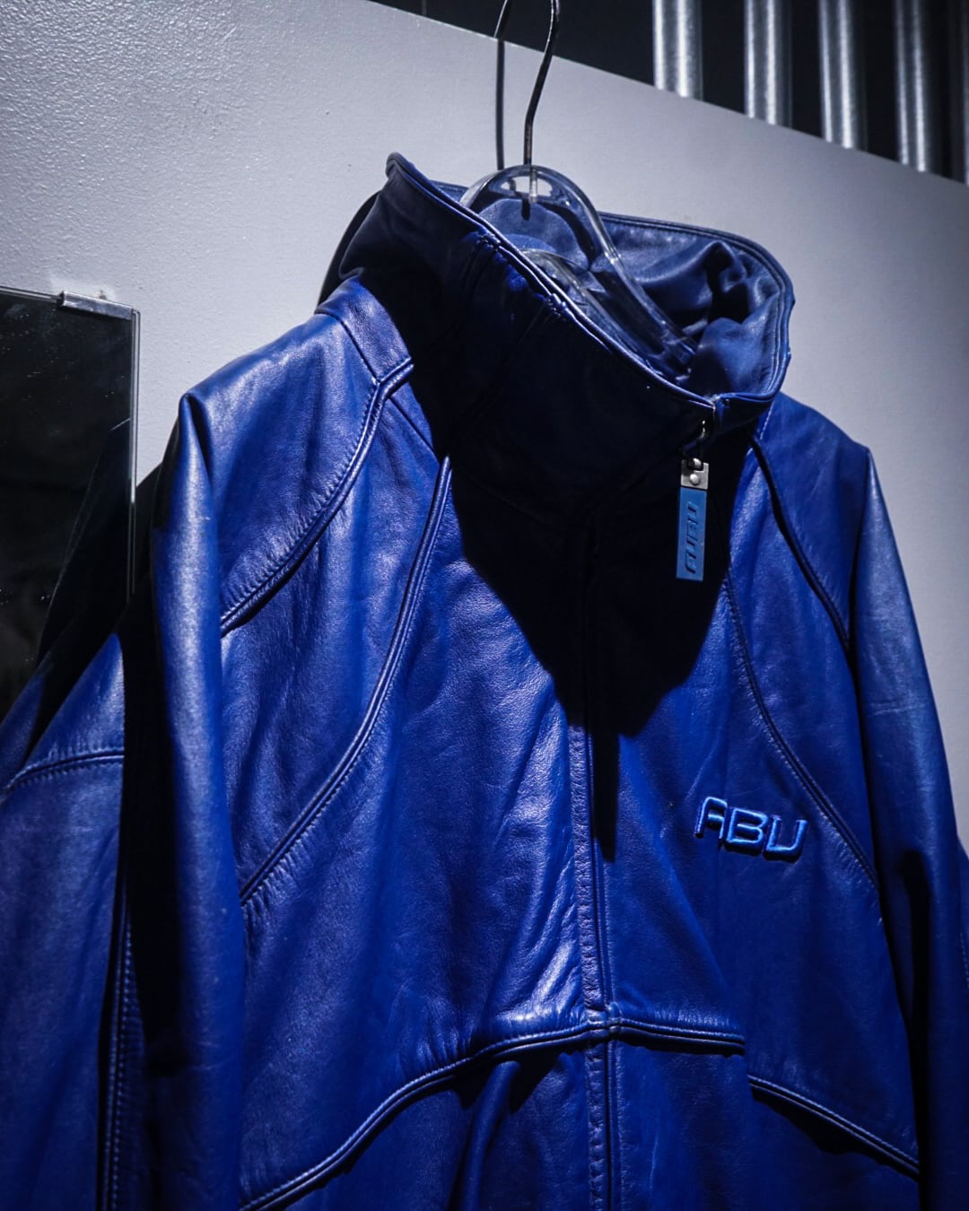 add (C) vintage】“FUBU” Vivid Blue Loose Leather Jacket | Caka