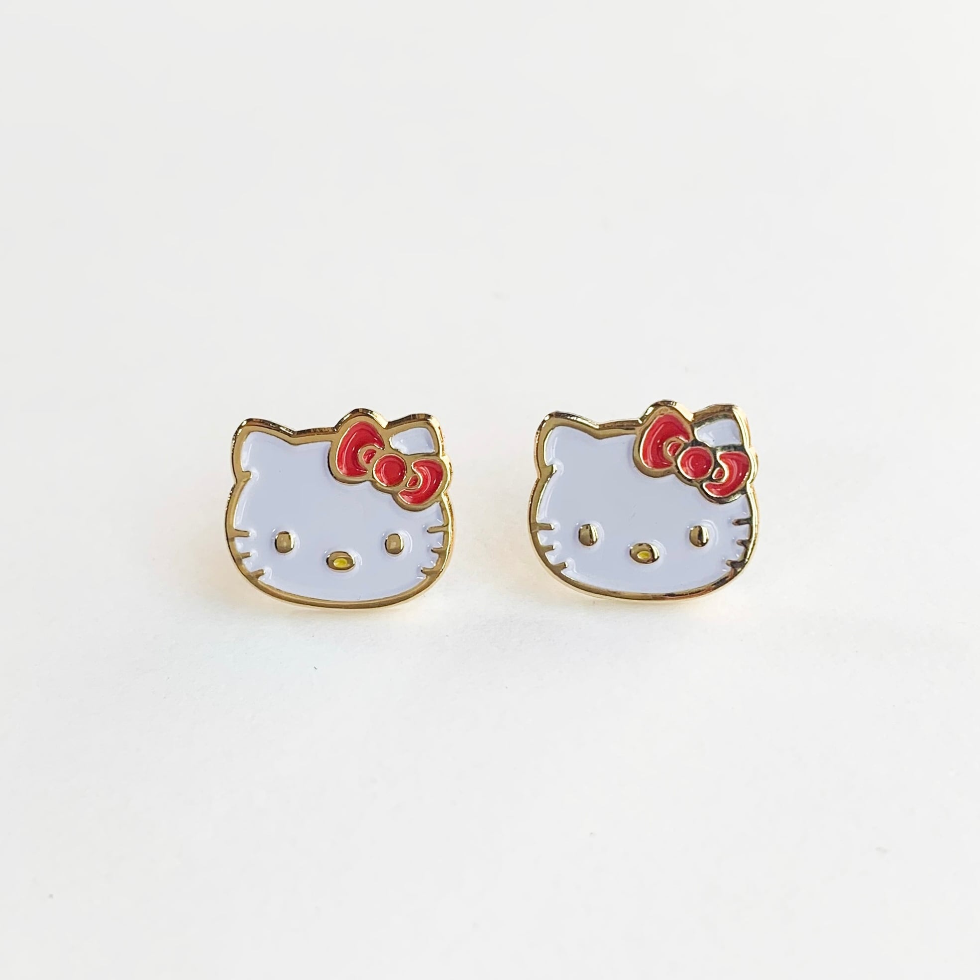 sanrio>ハローキティフェイス(ピアス/イヤリング) | BUTTON&CUFFLINKS