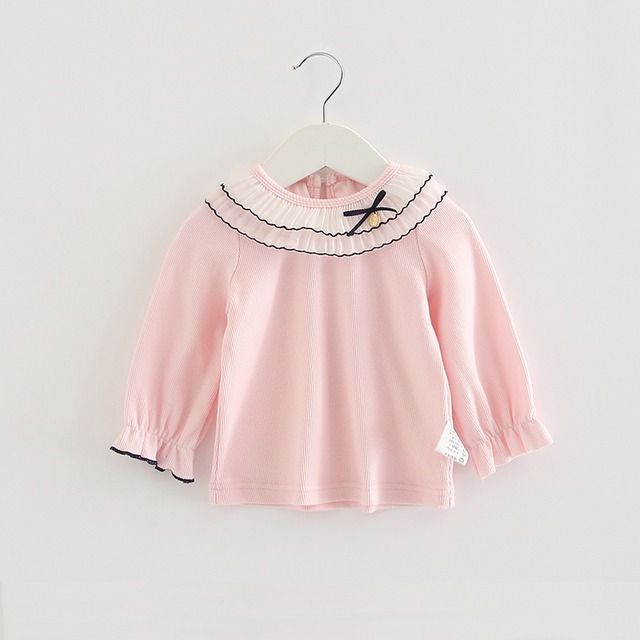 リボンとチャームの長袖トップス(ピンク)