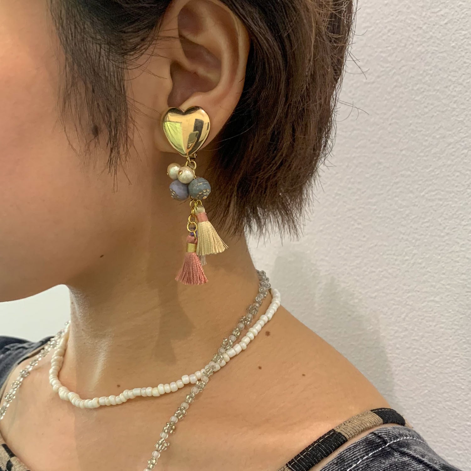 ハートとじゃらじゃらタッセルの〈ピアス/イヤリング〉 | Dua