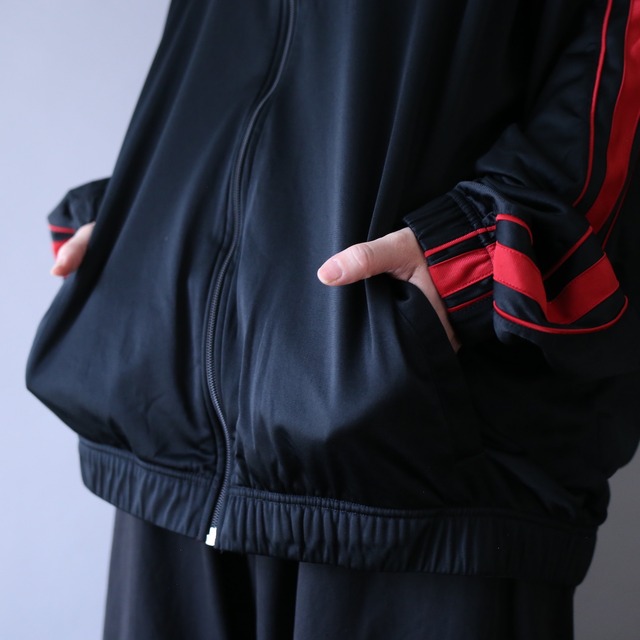 "NIKE" black × red over silhouette track jacket