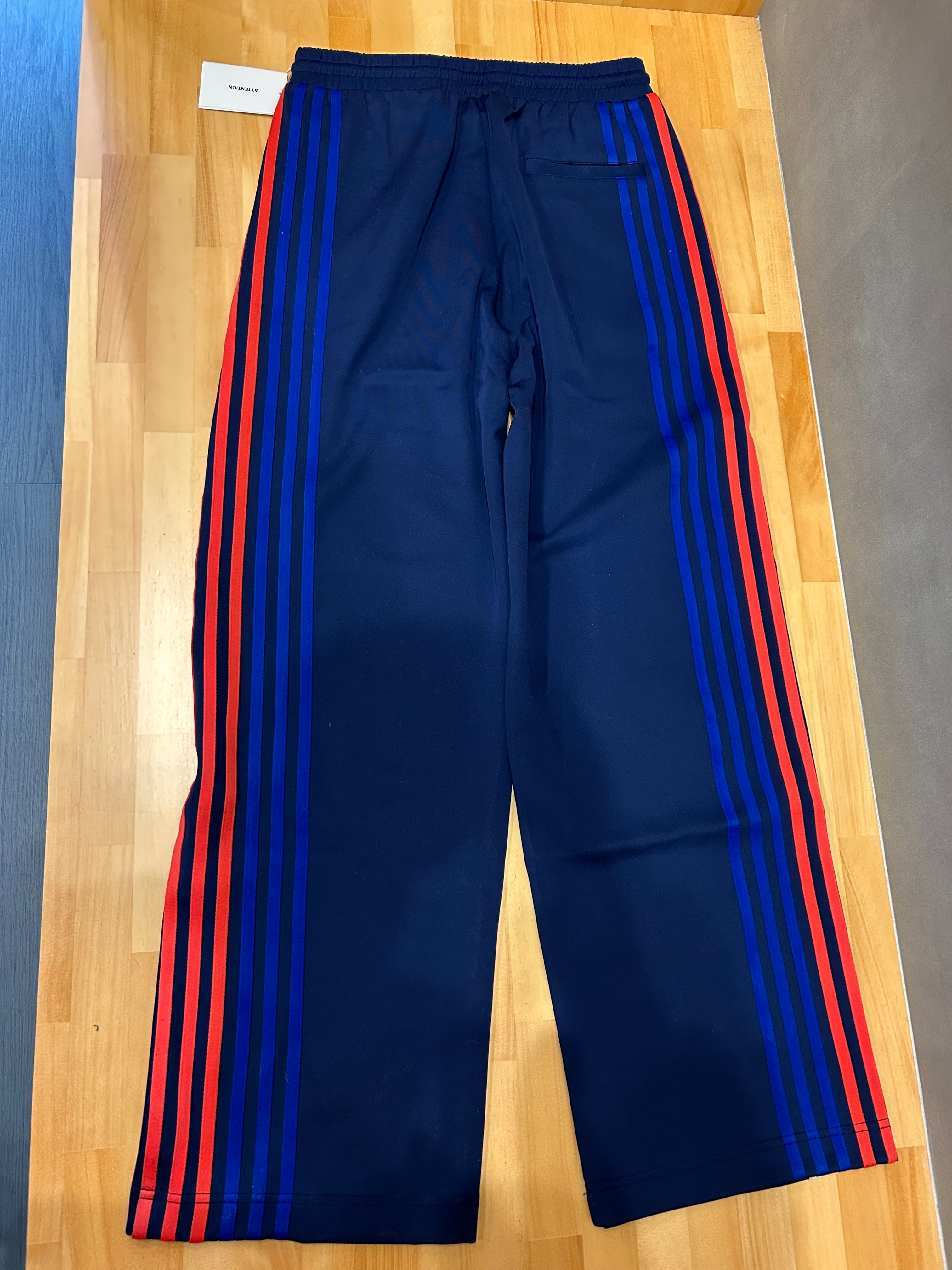 DISCOVERED ディスカバード】TRACK PANTS MULTI | delhezi