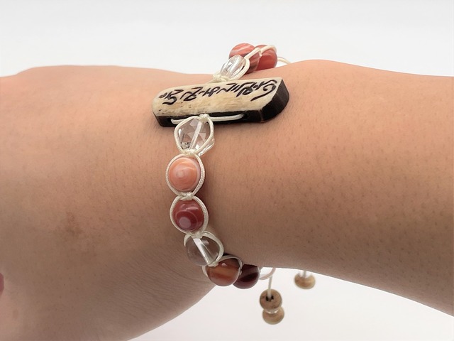 編みブレスレット（ボーン【オンマニ】・水晶【ヒランヤ】・赤天眼石・水晶）