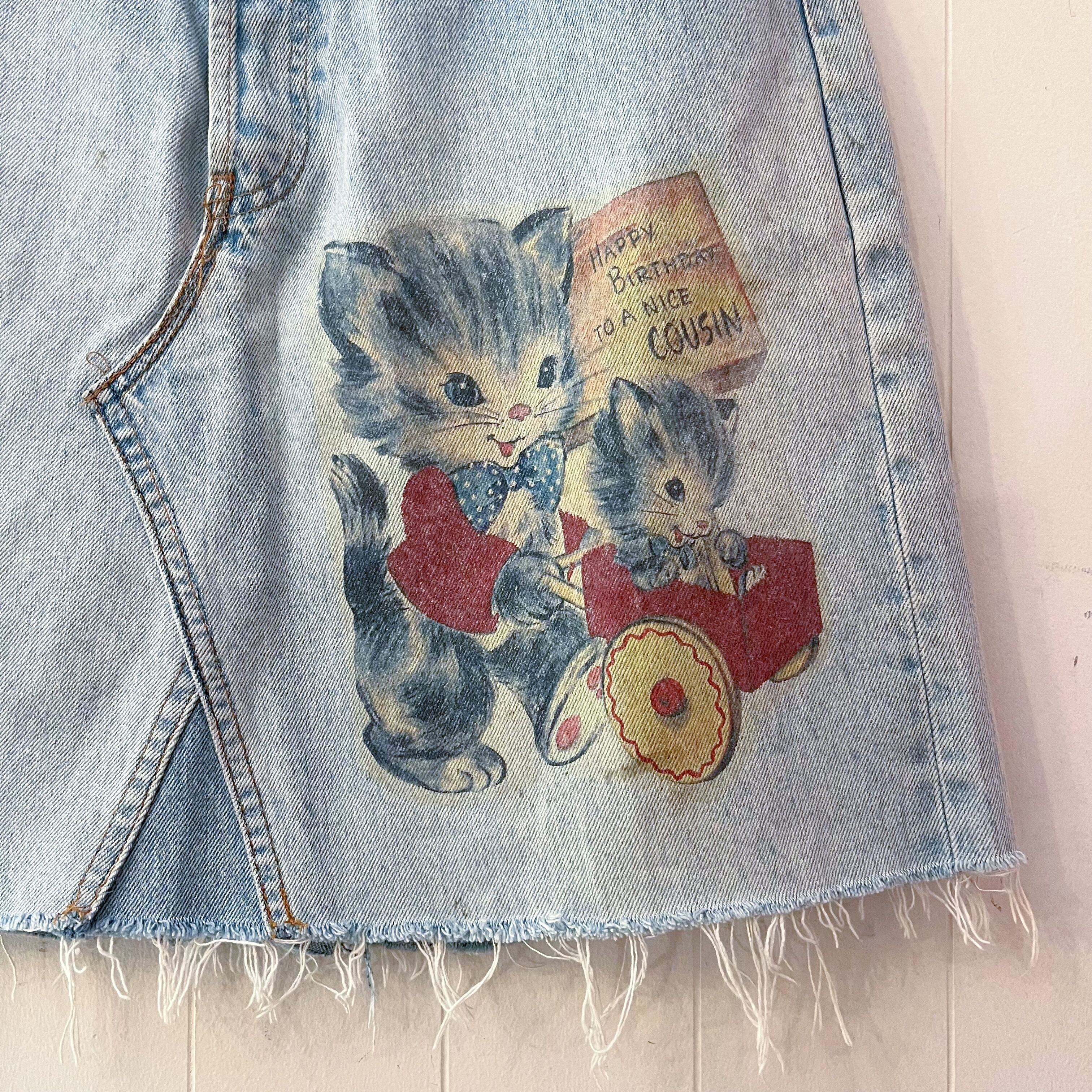 cat printed denim skirt