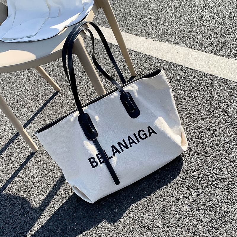 バッグレディースバッグ2020夏ニュータイドネットレッド大容量キャンバスショルダーバッグインファッションワイルドハンドバッグ Tiancai_Wing_Bag5932948