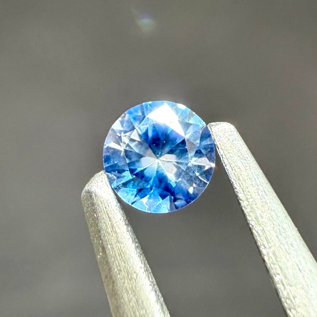 スリランカ産バイカラーサファイアオレンジ×ブルー0.29ct 4.46×3.5