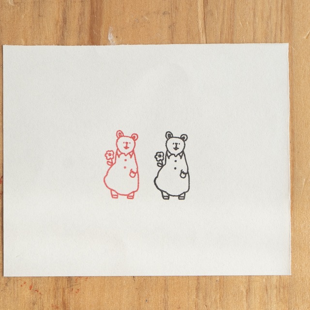 クマの「 ほあ」と花