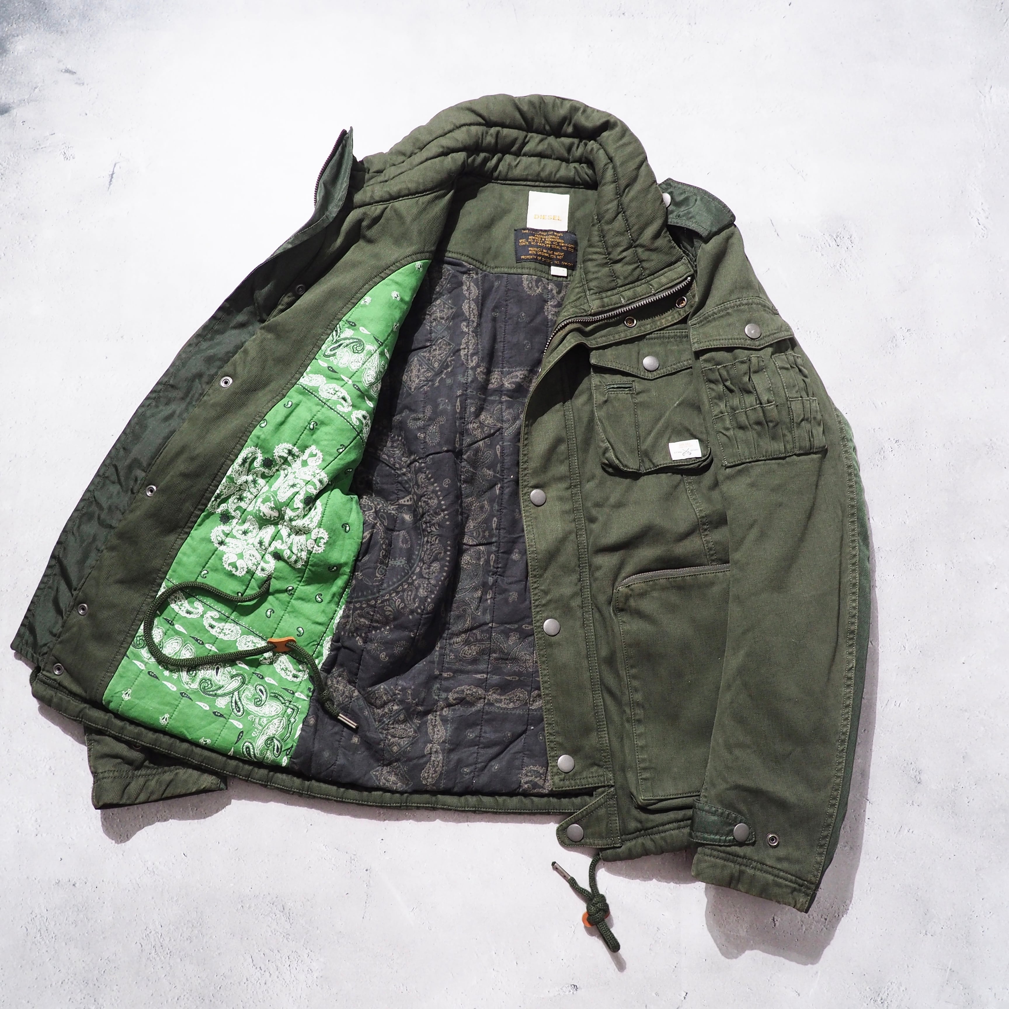 " DIESEL " Big Pockets × Switching nylon High neck Military jacket