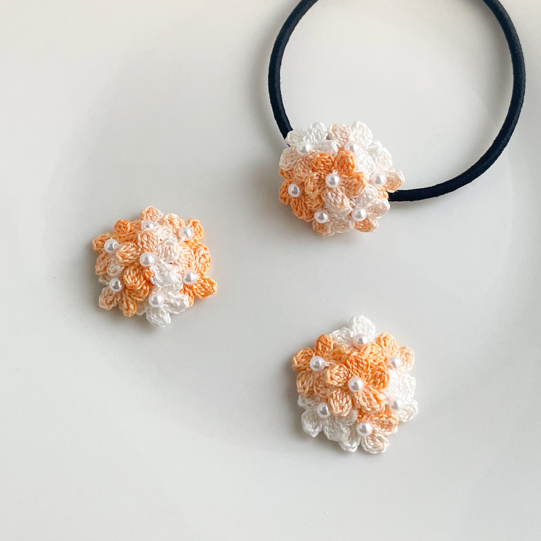 レース編みのヘアゴム オレンジグラデーション | そらの音