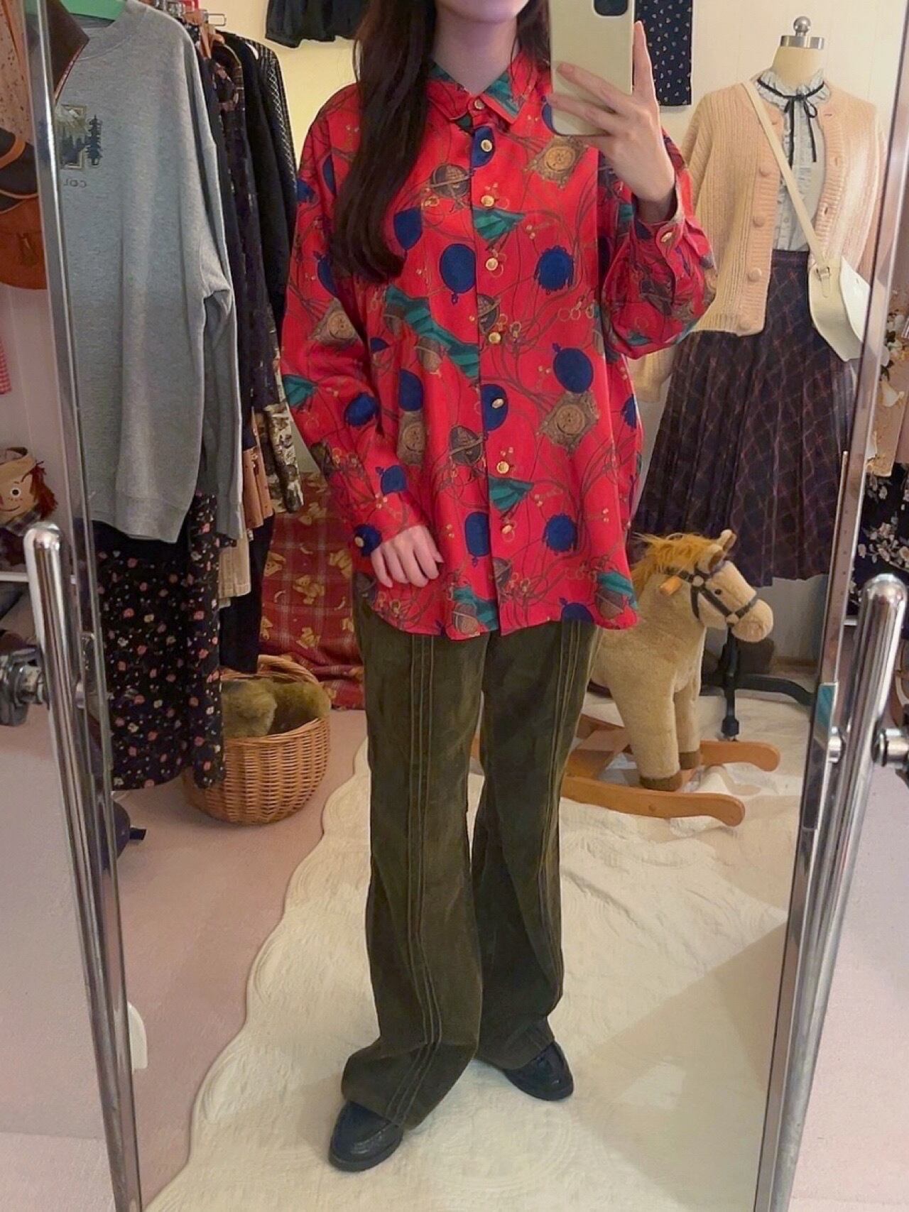 clock and globe red satin blouse