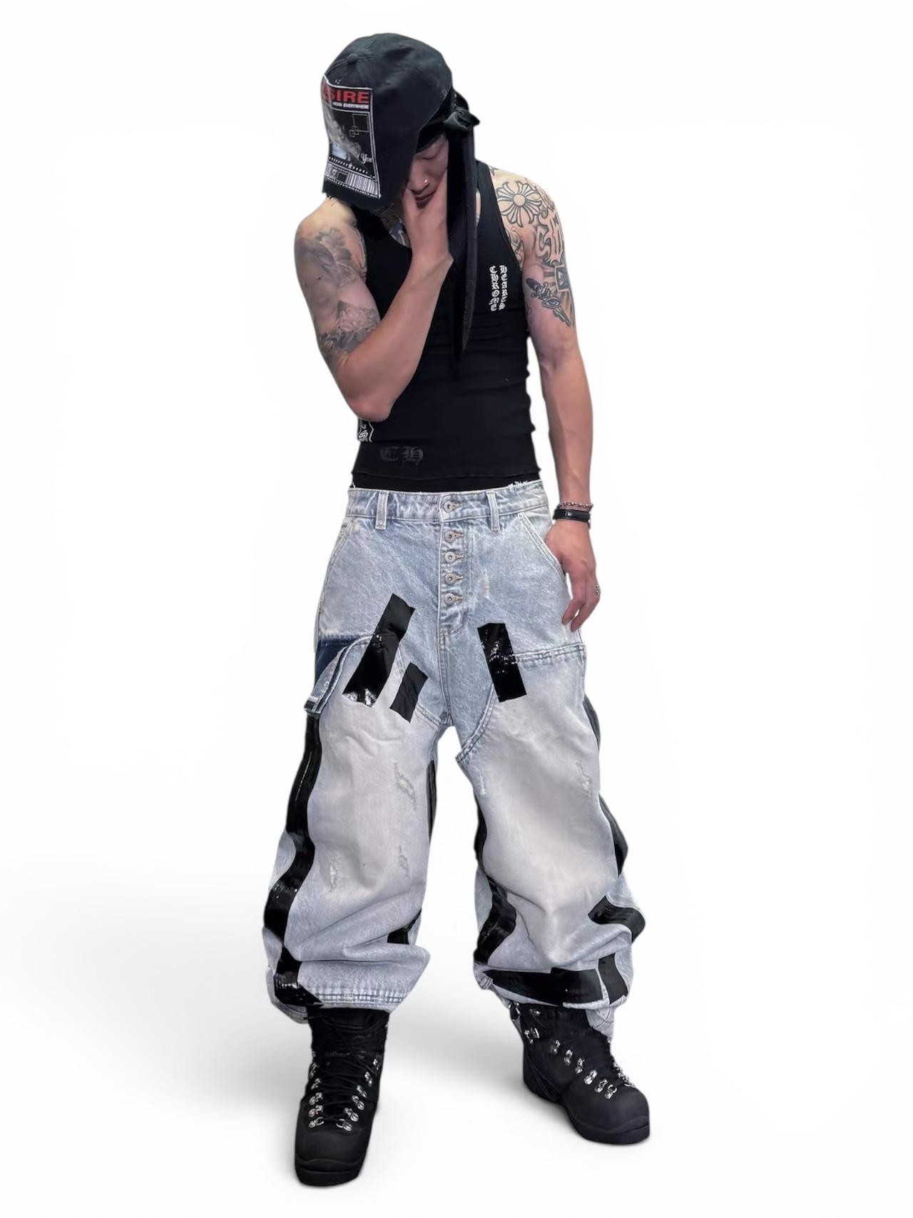 【RYE CHASIN】Duct-taped washed denim jeans