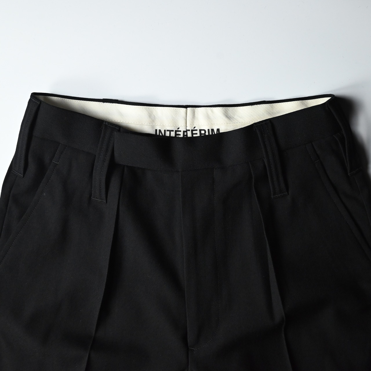 INTERIM / MILITARY WOOL SERGE 1-TUCK FRENCH ARMY WIDE TAPERED TROUSER