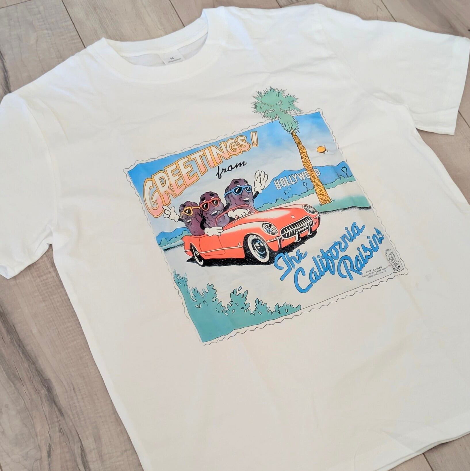 【 California Raisins( カリフォルニアレーズン )】『 GREETINGS! from Hollywood 』/ Tシャツ〚アメリカン雑貨 アメトイ〛