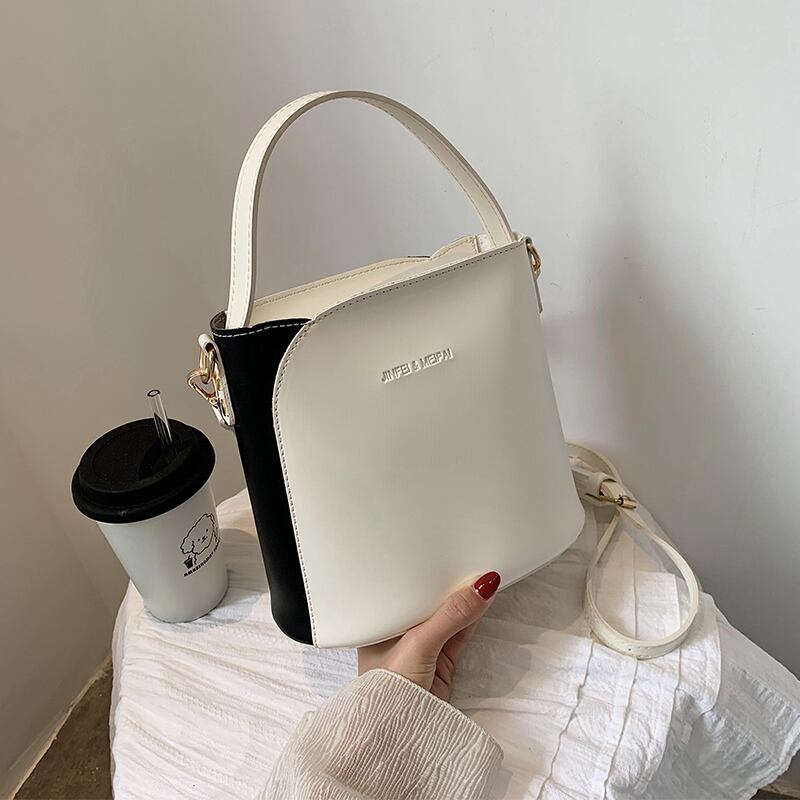 夏の小さなバッグ女性バッグ2020人気の新しい波シンプルなワイルドワンショルダーメッセンジャーバッグネット赤ファッションバケットバッグ Tiancai_Wing_Bag6103096