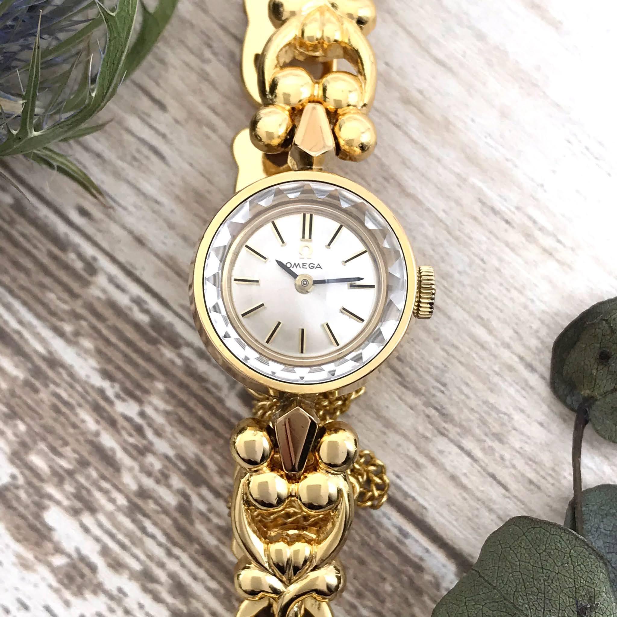 【稼働品】OMEGA ビンテージ　サファイヤ カットガラス　手巻腕時計