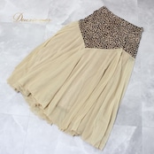 社交ダンス 衣装 スタンダード スカート レッスンウェア レディース ベージュ系 ブラウン系 レース ヒョウ柄 練習着 ステージ衣装 上品 ダンス衣装 レオパード シック エレガント 大人可愛い 舞台衣装 ポリエステル フレアスカート アシンメトリー風 きれいめ 伸縮性 ポケットなし レース風デザイン 丈長め ミドル丈 83cm前後 ゴムウエスト ウエストゴム フィット感 たっぷりフレア