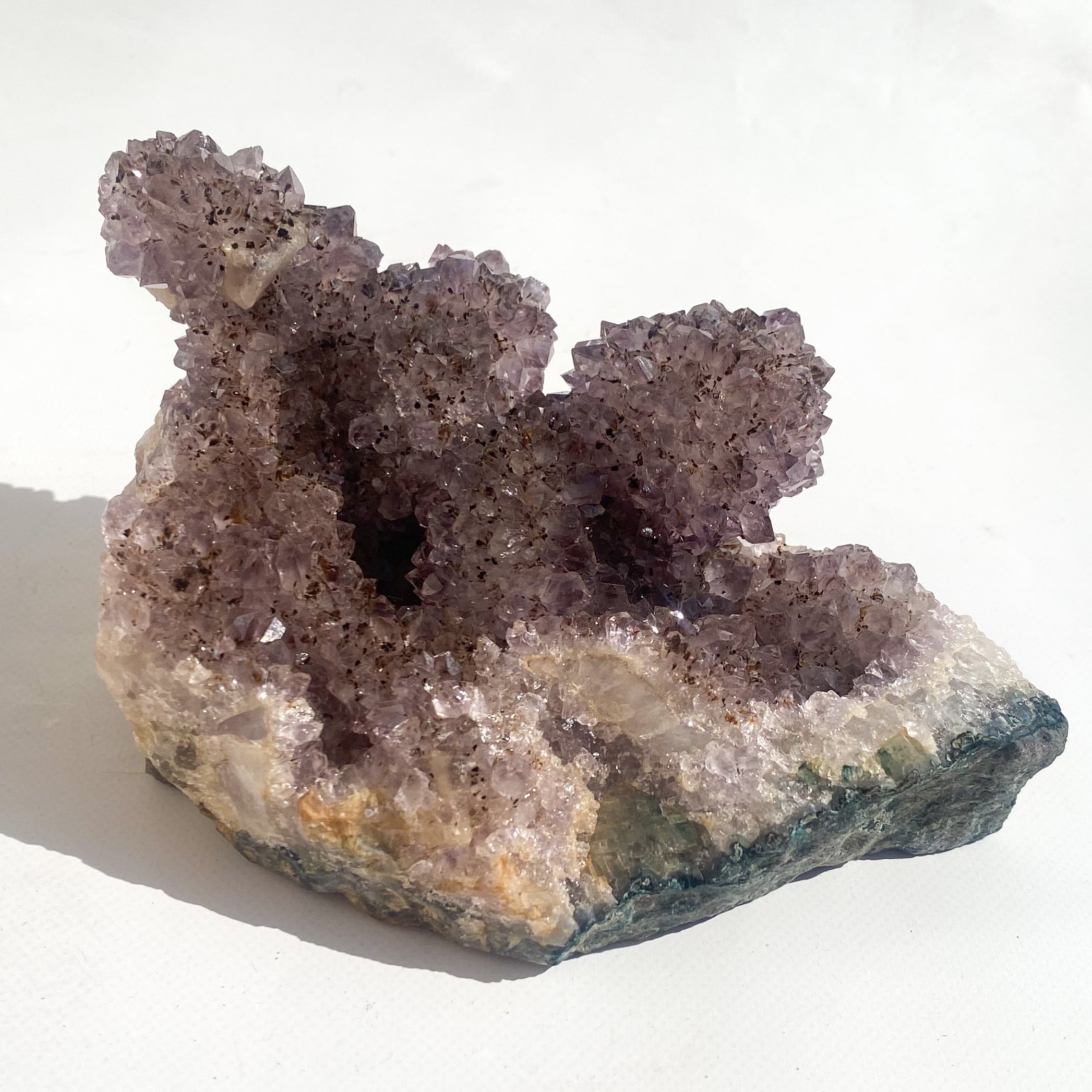 Cacoxenite in amethyst