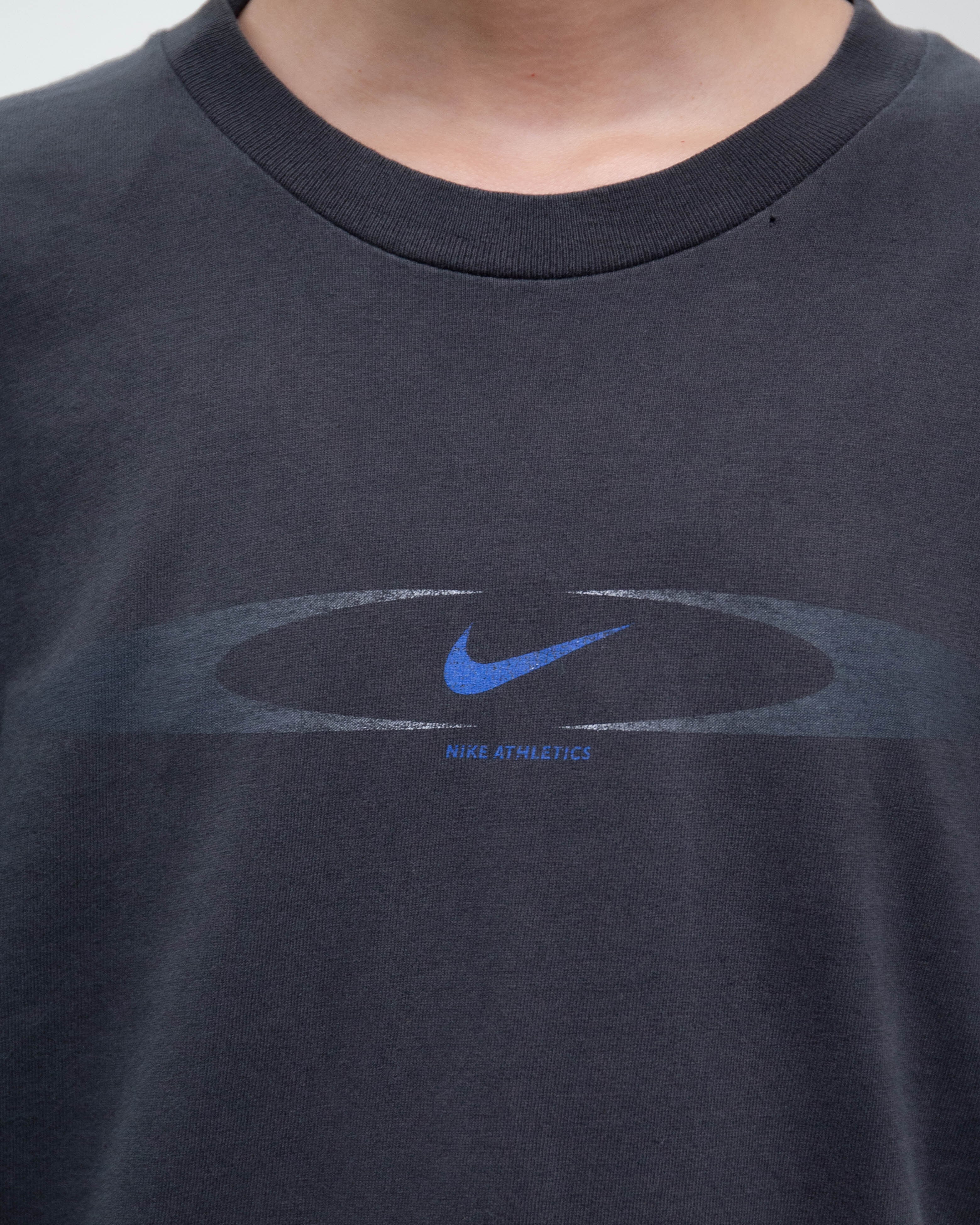 1990s NIKE - oval graphic swoosh T-shirt | LUIK FINN