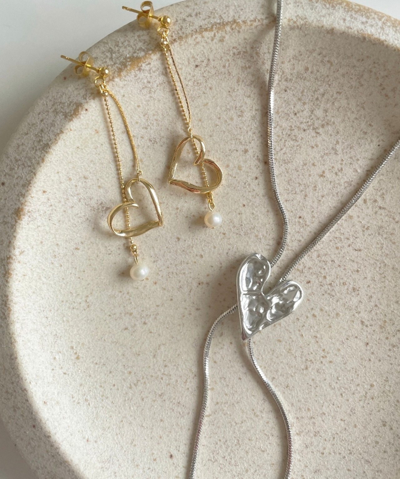 S I U R | nuance heart tie necklace _ 316L