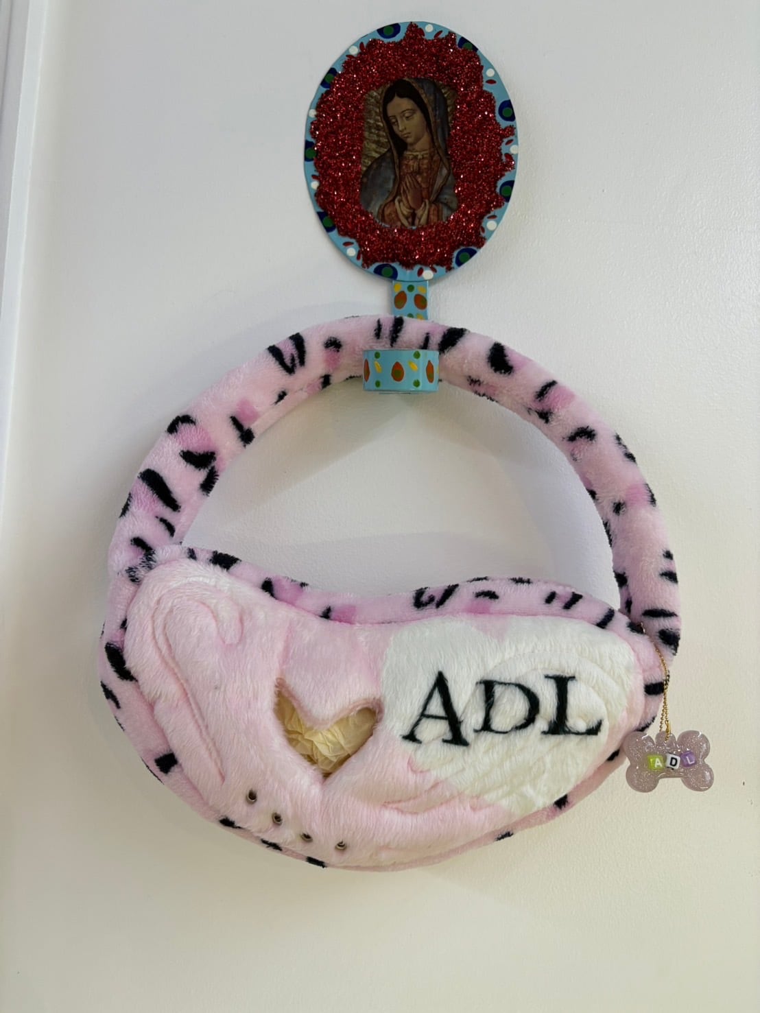 Ans Dotsloevner heart in his ear leopard adl