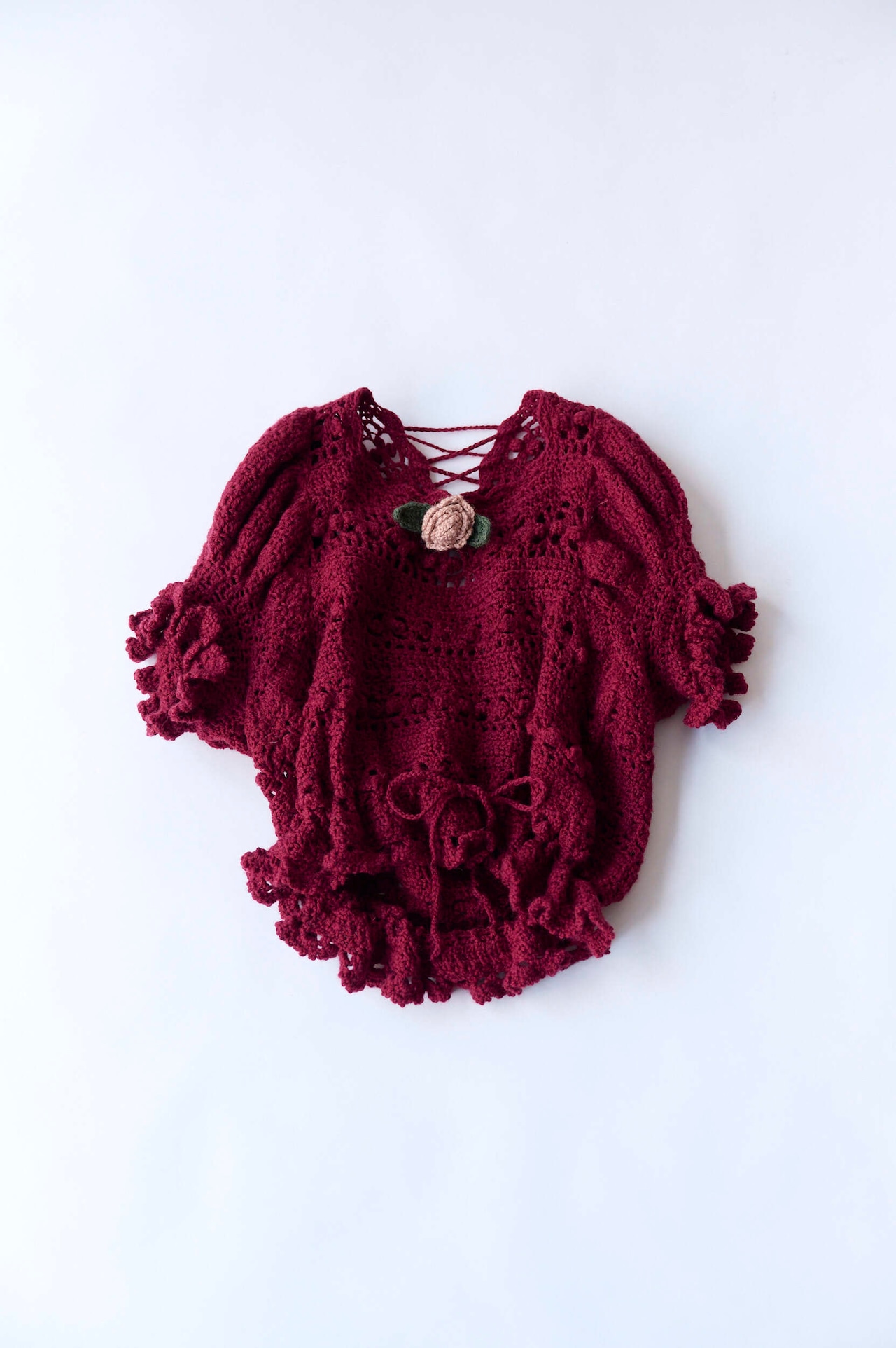 Crochet rose sweater
