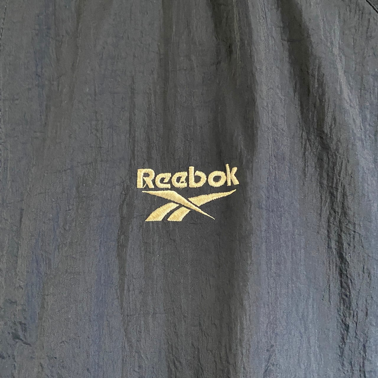 Reebok リーボック フロントロゴ刺繍 ジャケットメンズL 古着 バック