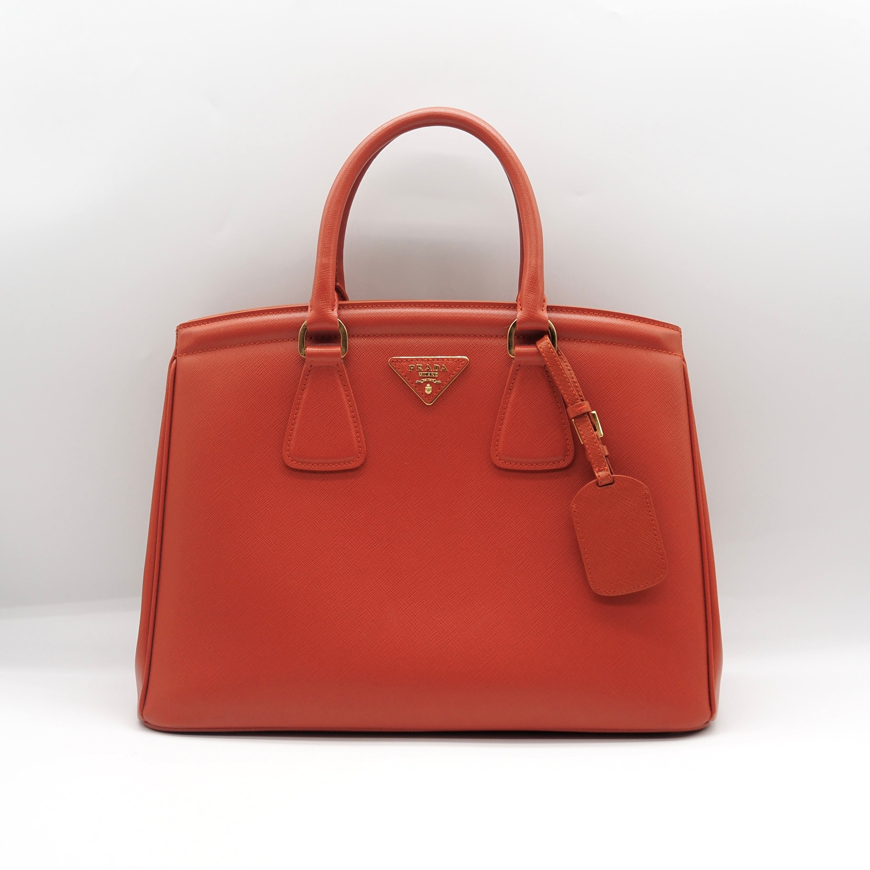 PRADA 三角ロゴサフィアーノレザーハンドバッグ オレンジ プラダ