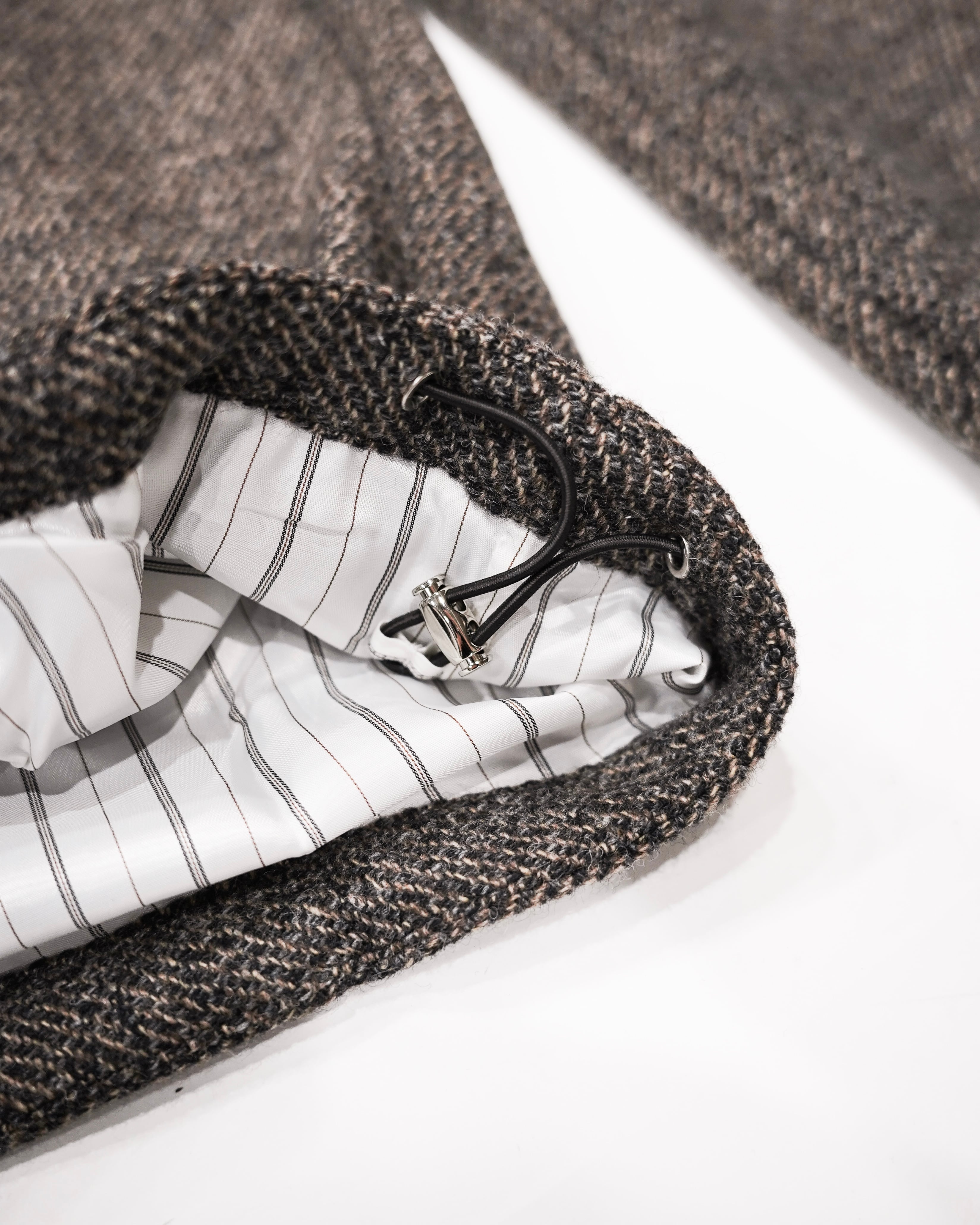 NULLUS AW25 WOOLEN INTERTWINED STRUCTURE TAILORED WIDE TROUSERS