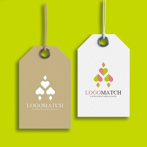 調和するハートとダイヤのロゴ