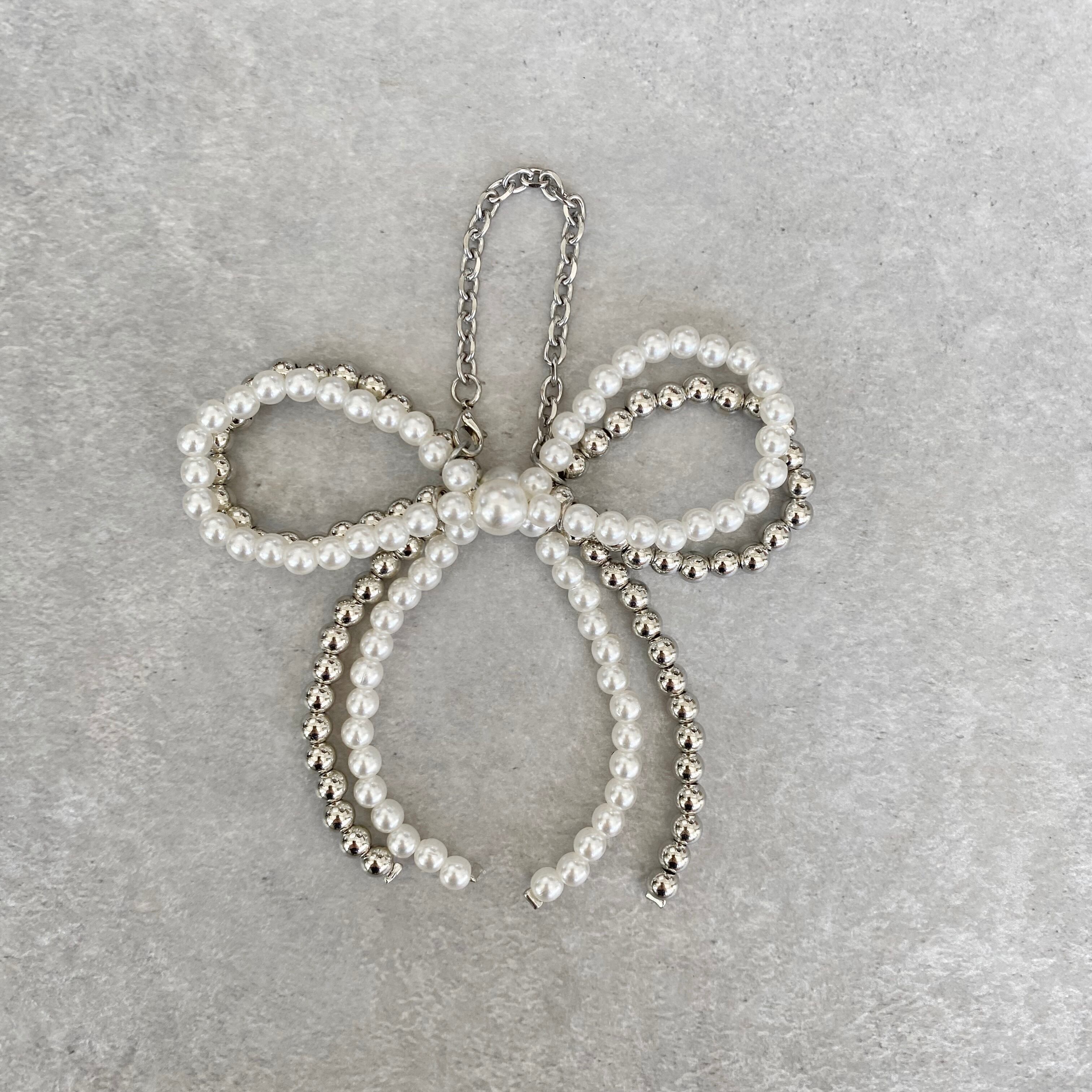 パールリボンチャーム | conforobe(コンフォローブ)