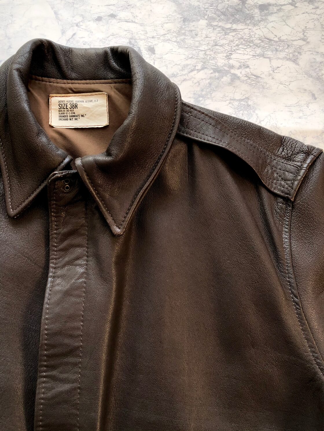 90s VINTAGE USAF / A-2 LEATHER JACKET BRANDED GARMENTS INC ORCHARD 