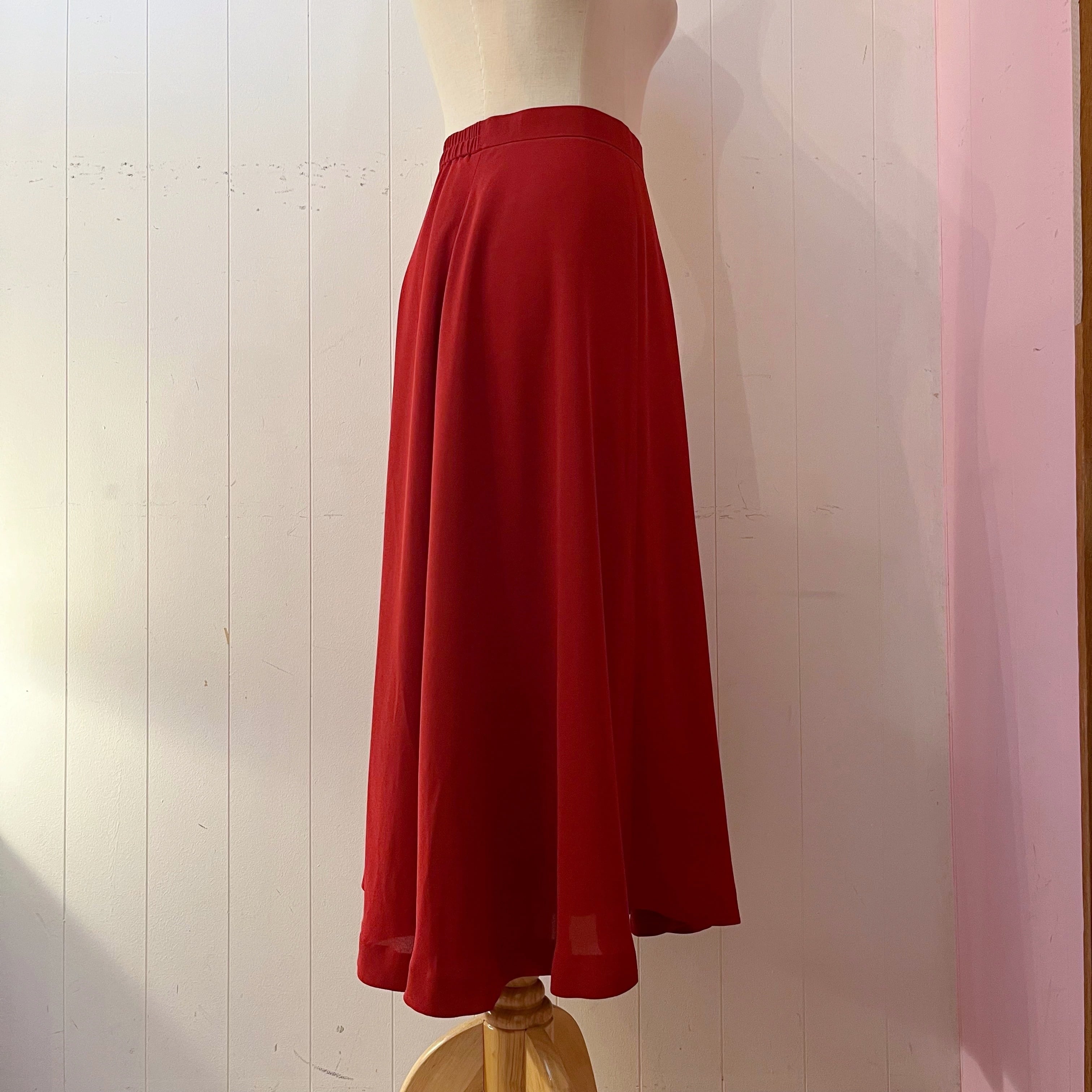 red seams flare skirt