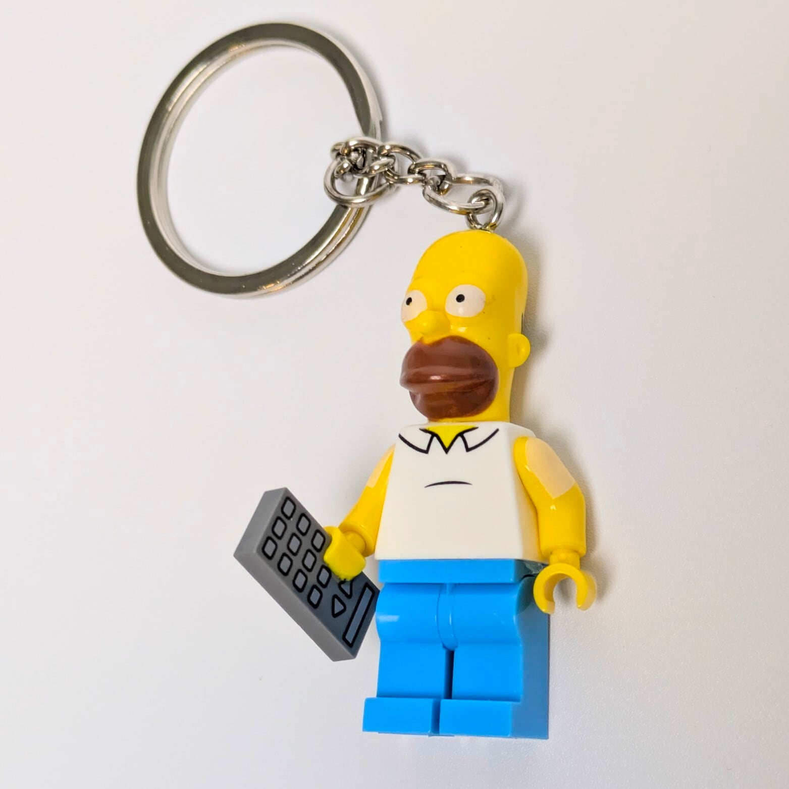 ★ブロックフィギュアキーホルダー★【 The Simpsons(ザ シンプソンズ)】ホーマー・シンプソンズ TVのリモコンは譲れないver.(笑)〚アメリカン雑貨 アメトイ〛