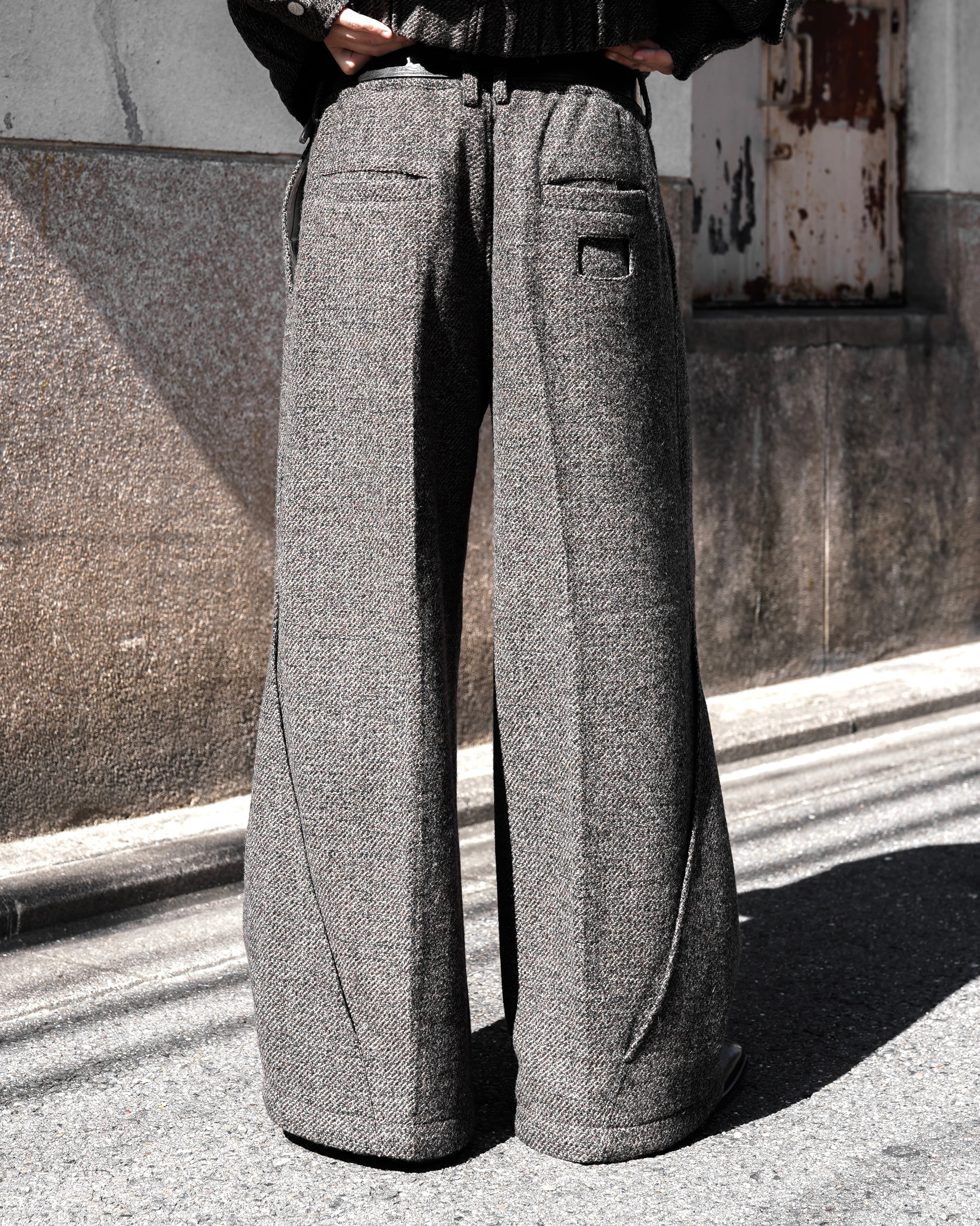 NULLUS AW25 WOOLEN INTERTWINED STRUCTURE TAILORED WIDE TROUSERS