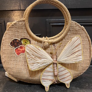 butterfly motif straw bag