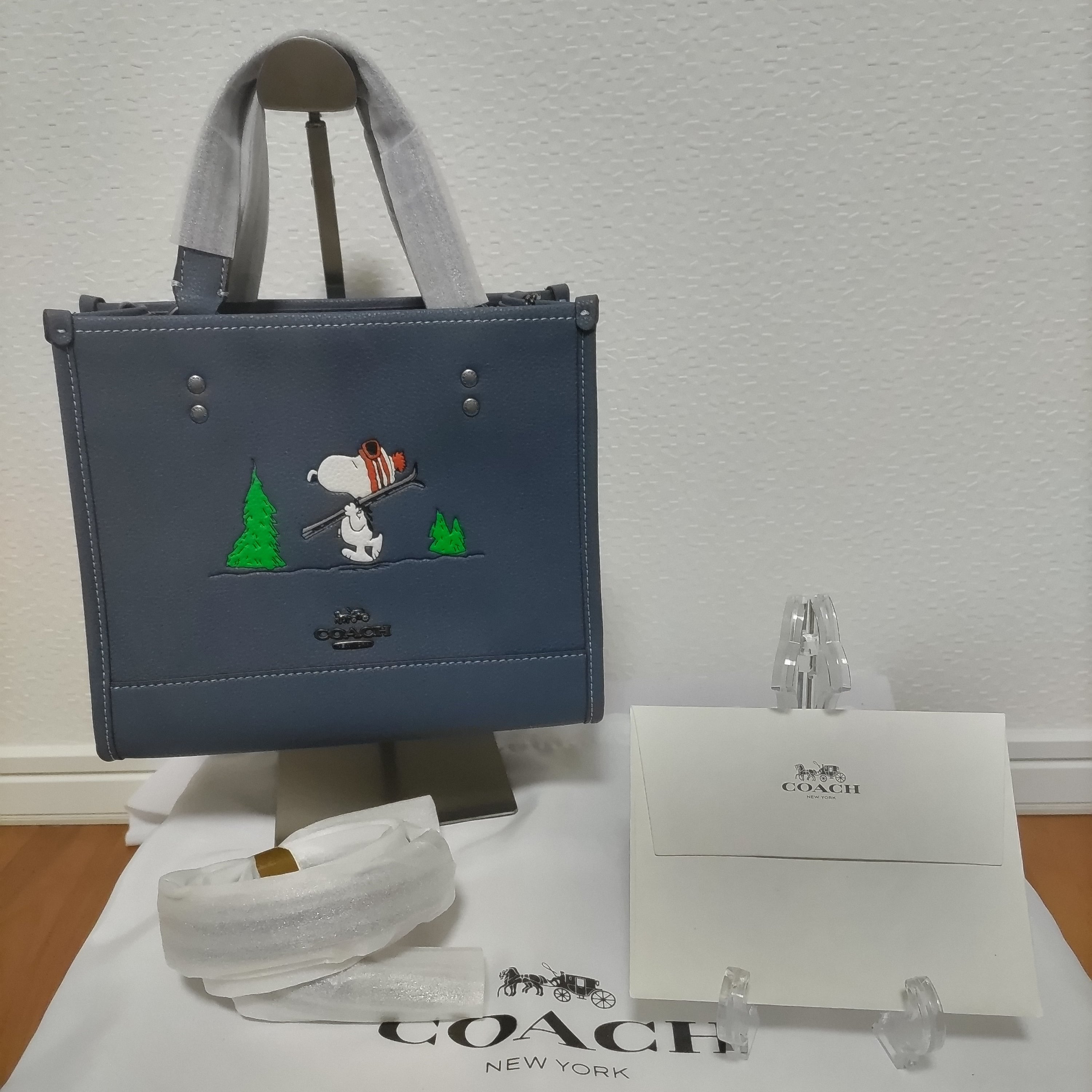 COACH コーチ スヌーピー コラボ トートバッグ デンプシートート 新作