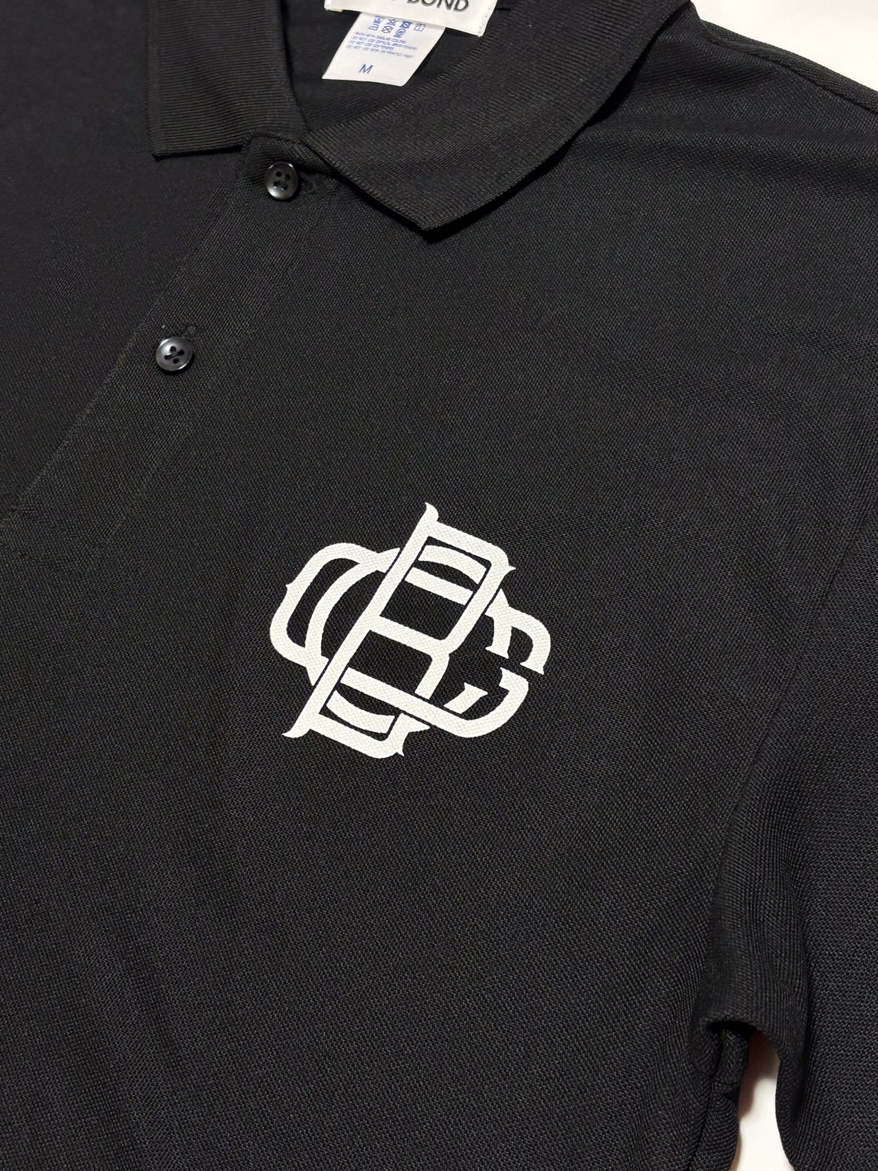 COLLEGE S/S POLO SH BLACK