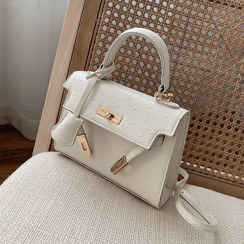 センスの小さなバッグウエスタンスタイルの女性2020新しい流行のファッションワイルドワンショルダーメッセンジャーバッグネットレッドポータブルケリーバッグ 手作りハンドバック7078545464