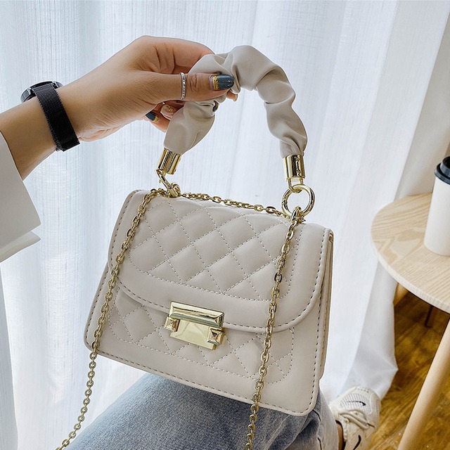 オールマッチウエスタンスタイルのスモールバッグハンドバッグ2020新しいトレンディなファッションチェーンショルダーメッセンジャーバッグネットレッドポータブルスモールスクエアバッグ Tiancai_Wing_Bag7711003