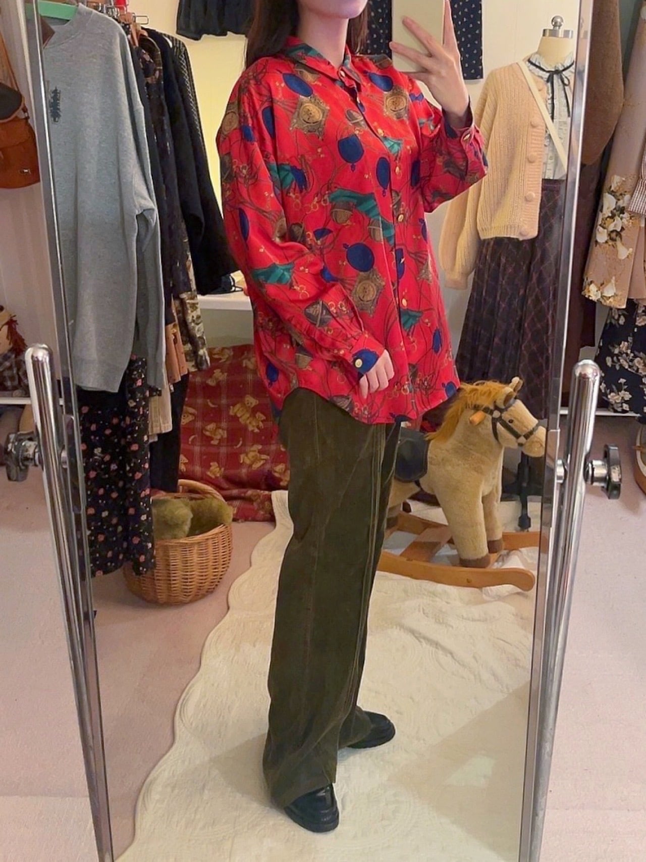 clock and globe red satin blouse