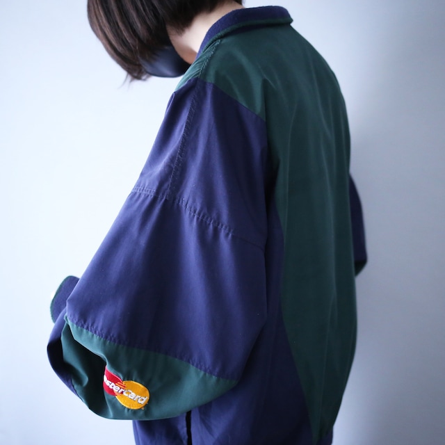 "Master Card" green × navy bi-color switching half-zip pullover