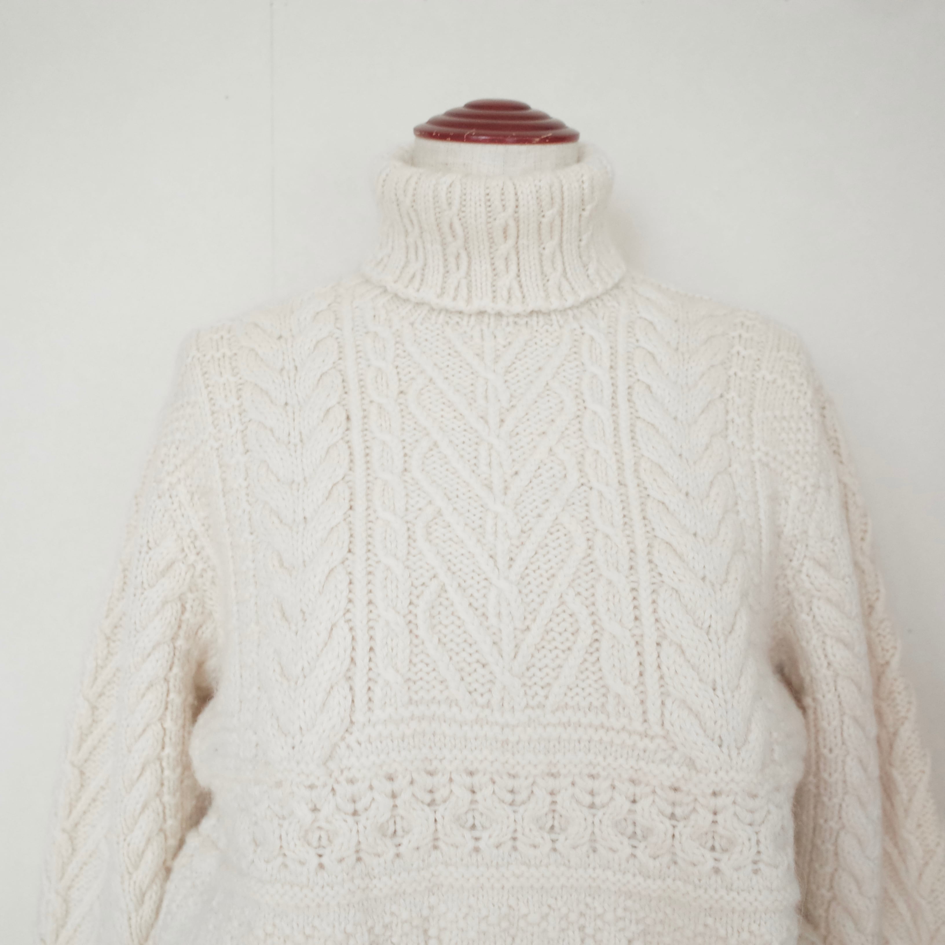 Turtle neck cable knit sweater