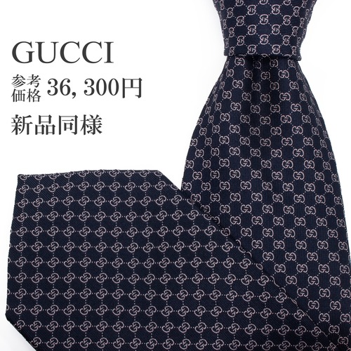 送料無料 グッチ ネクタイ レギュラータイ ジャガード 新品同様 黒 ブロンズ 総柄 光沢 マイクロGGロゴ マーク ハイブランド イタリア S548