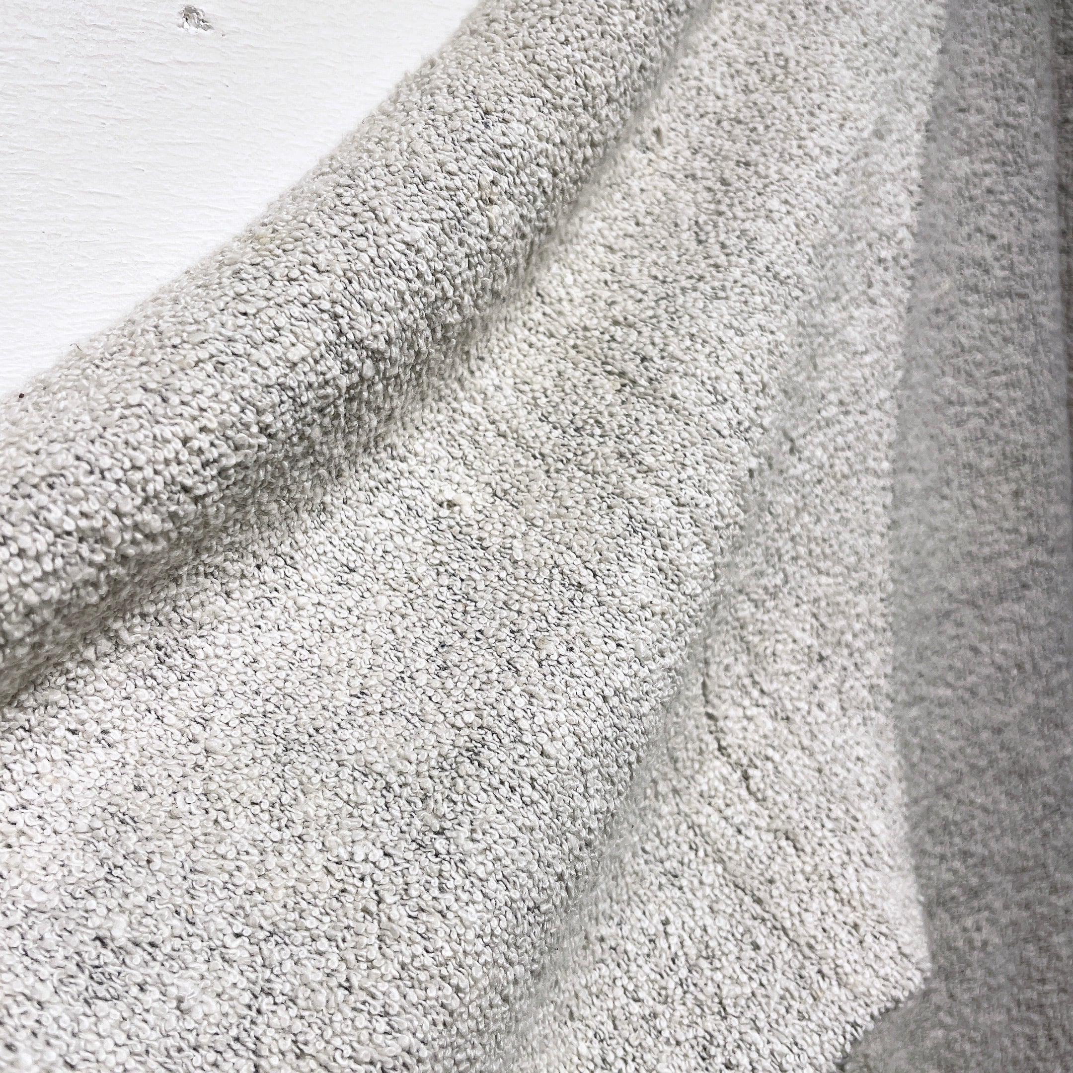 Ecru white color solid nep embroidery cotton knit